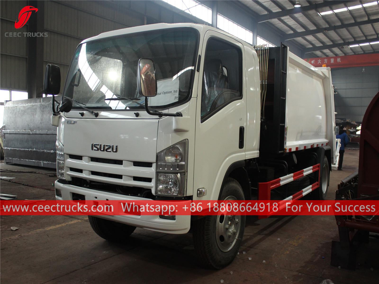 ISUZU 700p 8 cbm garbage compactor truck, in our factory plant. ISUZU 700p 8 cbm garbage compactor truck, in our factory plant.