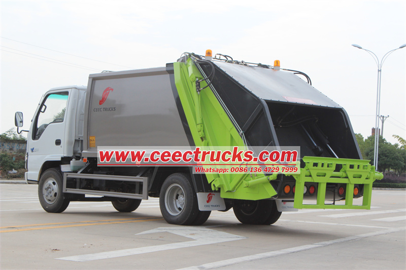 Isuzu rear loader compactor truck