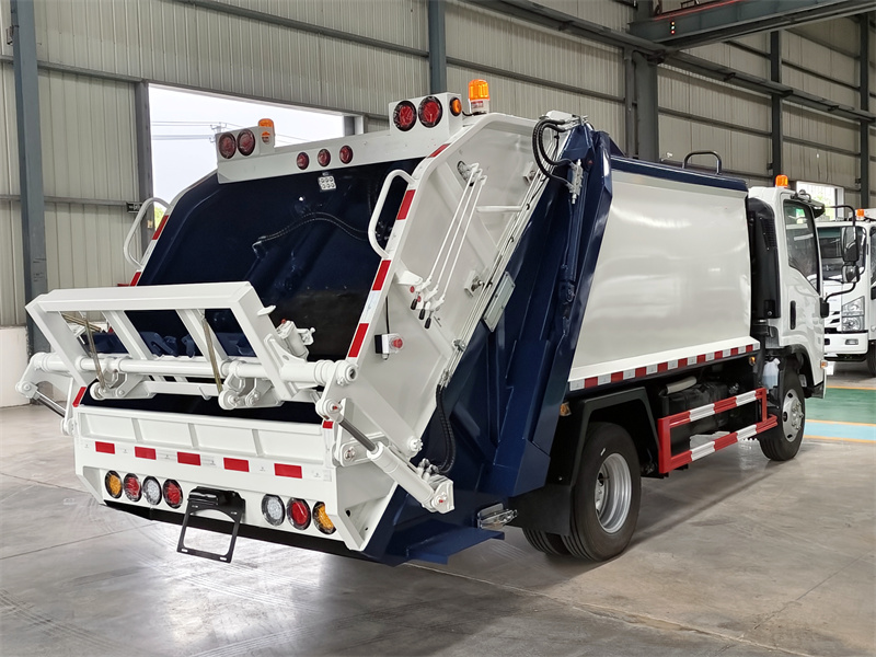 Isuzu NPR garbage compactor truck